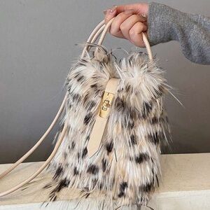 ⭐️NWT Faux Fur Tan and Black Women's Bag